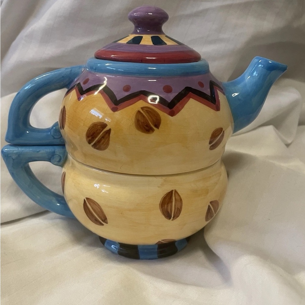 Artistic Ceramic Teapot and Cup Set with Blue Handles